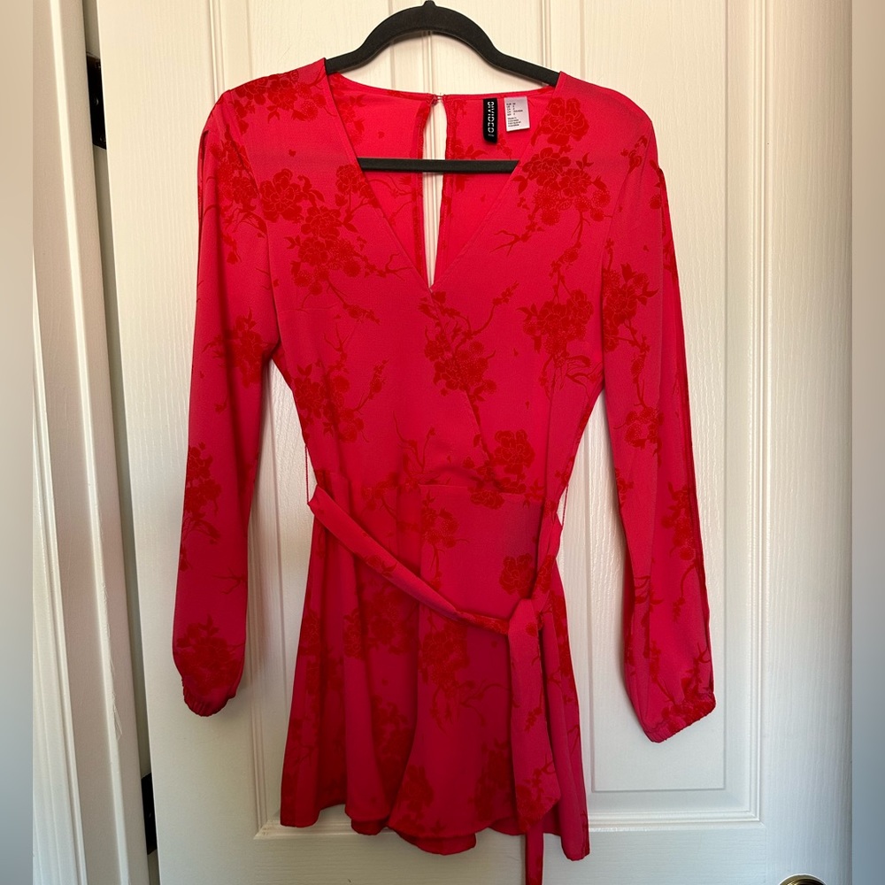 Floral long sleeve romper size 2